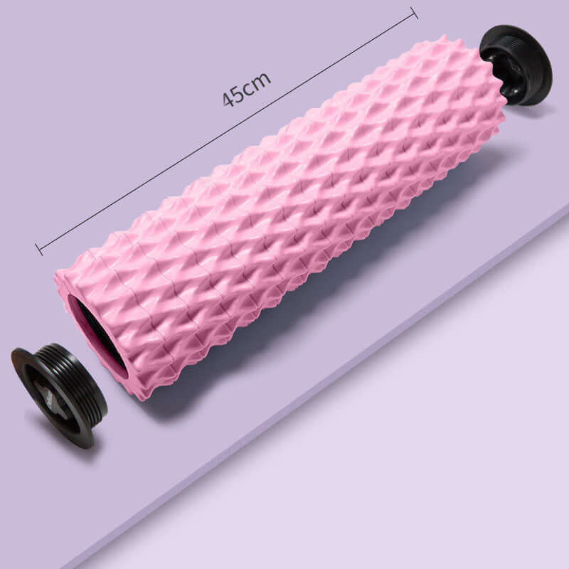 Pink foam massage roller 45cm with textured surface, ideal for muscle recovery and yoga exercises.