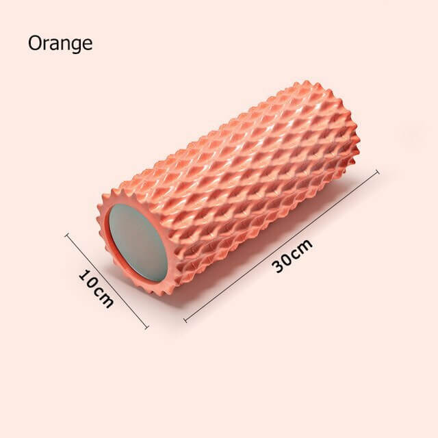Foam massage roller in coral orange color, 30cm long and 10cm wide, ideal for yoga and muscle recovery.